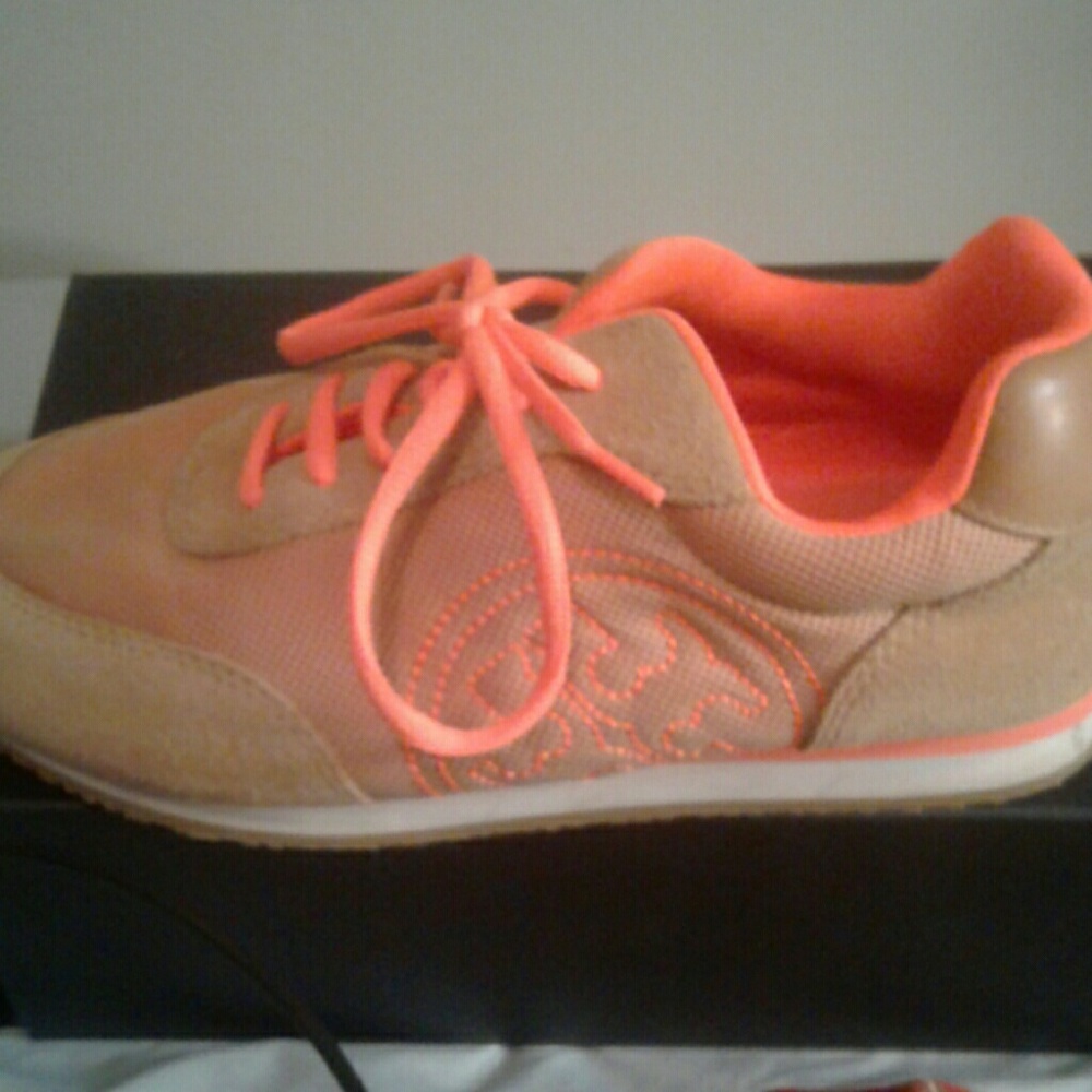 Tory Burch neon orange sneakers. Worn a few times!